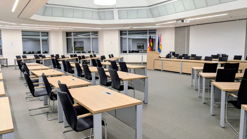 Constituency Surgery Held Hostage by Scale Model, Forty-Seven Laminated Photographs, and a Man With Time